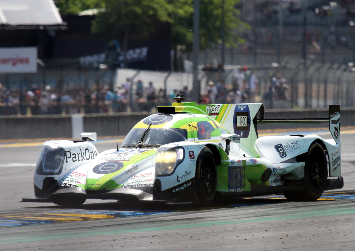 Oreca 07 - Mark Kwamme, Jan Magnussen & Anders Fjordbach exit Dunlop Chicane at the 2023 Le Mans (53367111800).jpg