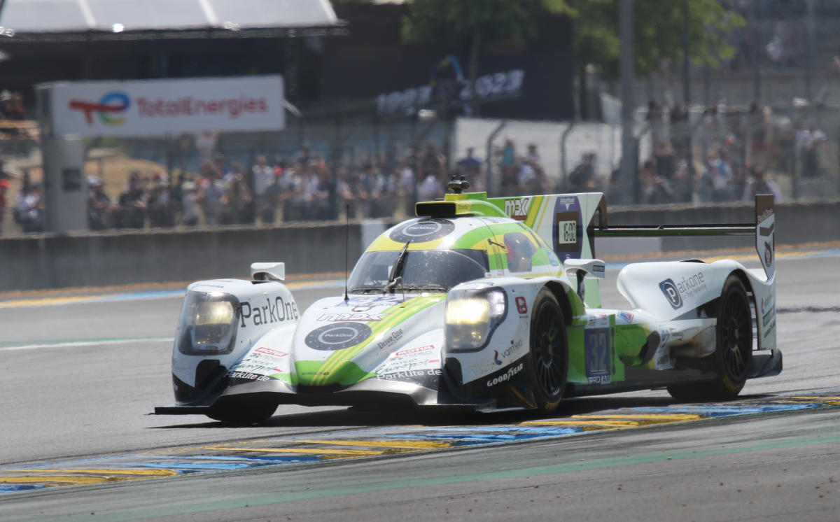 Oreca 07 - Mark Kwamme, Jan Magnussen & Anders Fjordbach exit Dunlop Chicane at the 2023 Le Mans (53365771647).jpg