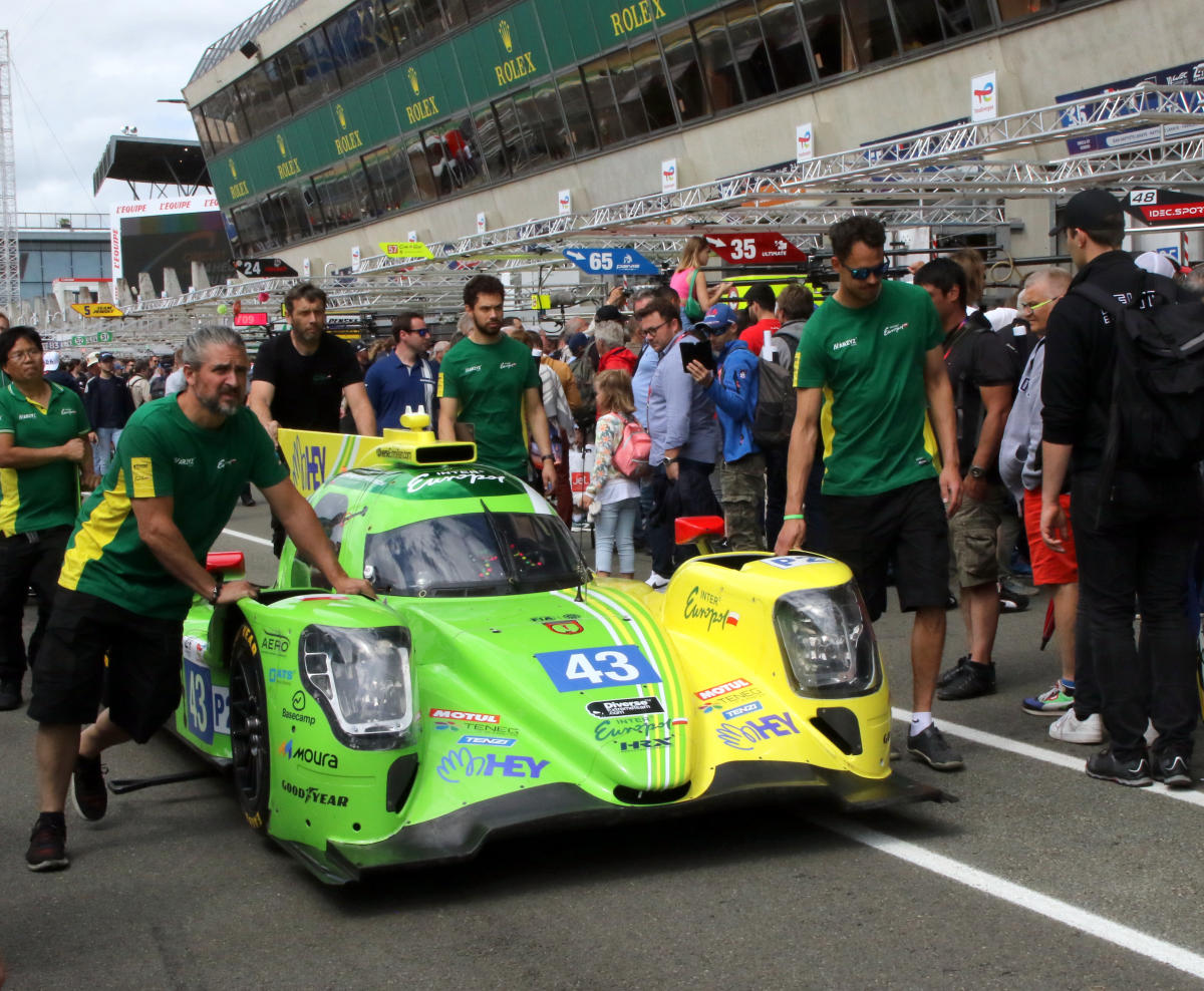 Oreca 07 - David Heinemeier-Hansson, Fabio Scherer & Pietro Fittipaldi is pushed down the pit lane for the Pit Stop Challenge at the 2022 Le Mans (54279657129).jpg