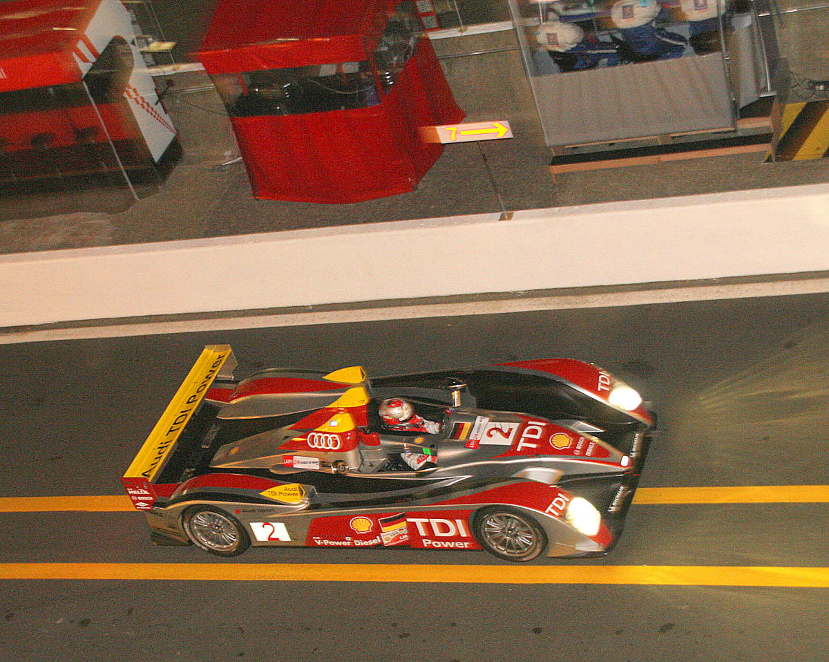 Audi R10 TDI - Rinaldo Capello, Allan McNish & Tom Kristensen in the pit lane at the 2008 Le Mans (55058248291).jpg